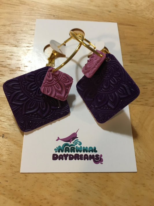 Textured dark purple and mauvey-purple squares on gold hoop earrings