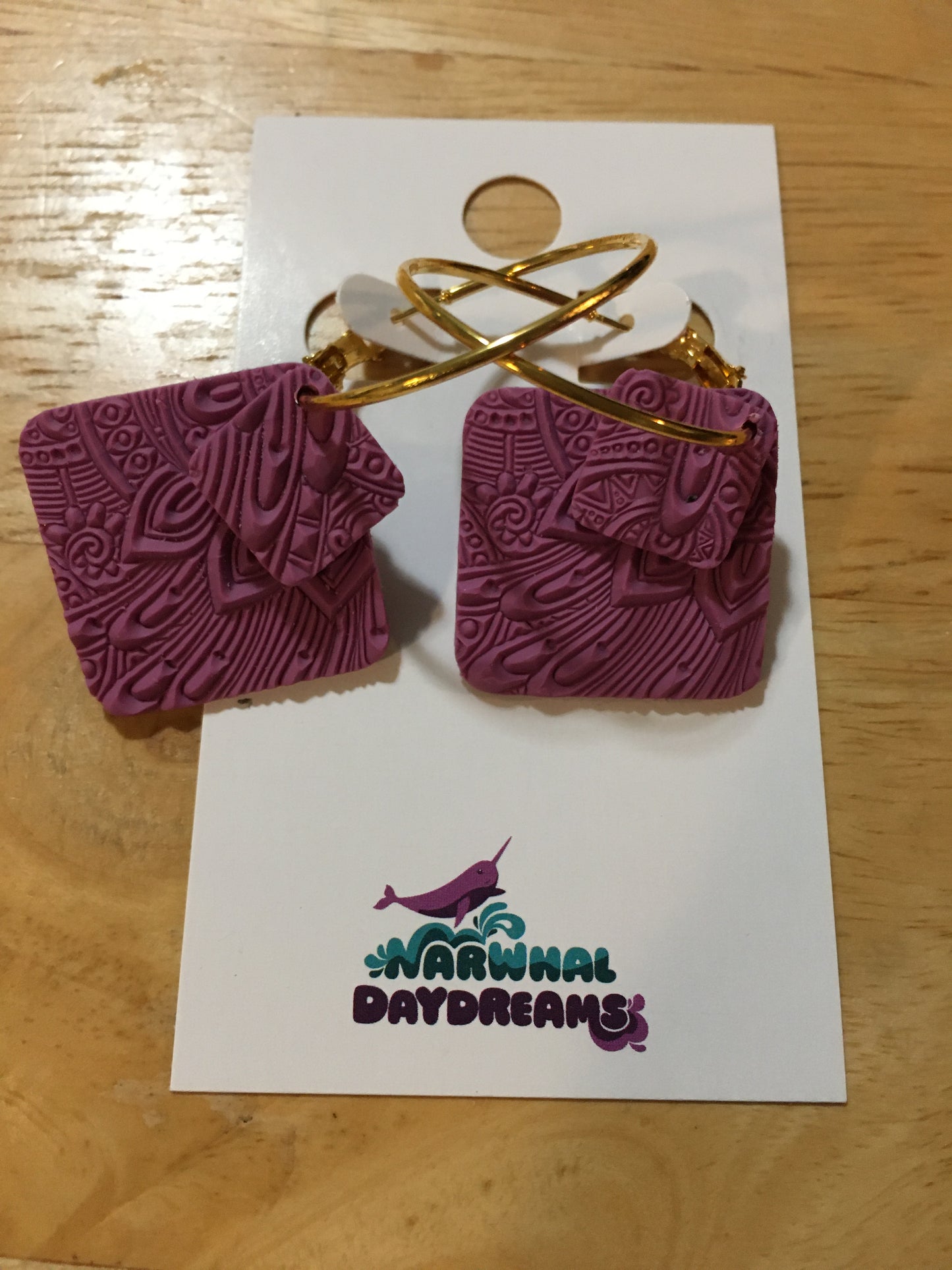 Textured mauvey-purple squares on gold hoop earrings