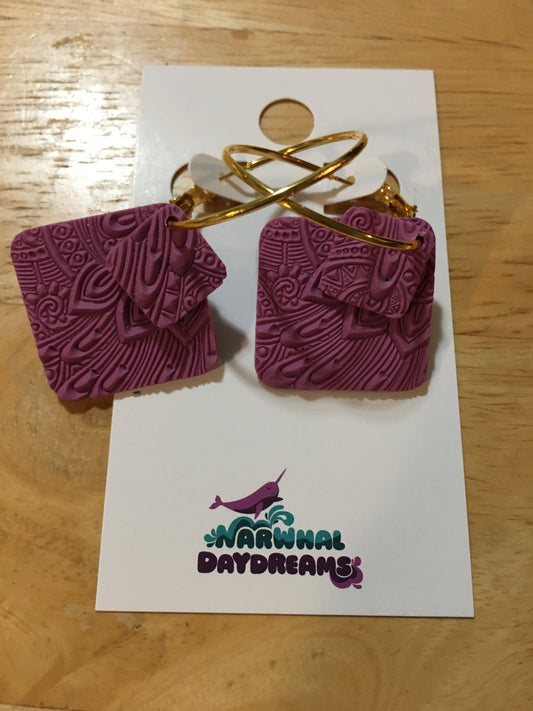 Textured mauvey-purple squares on gold hoop earrings