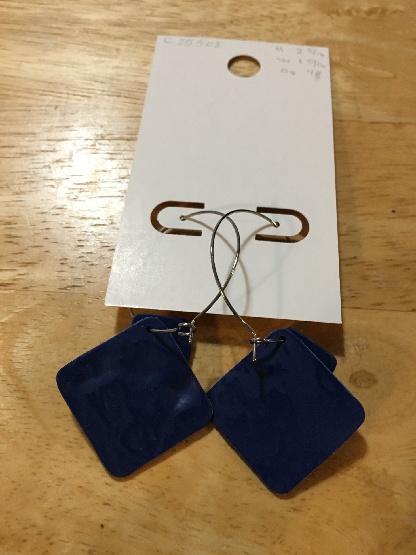 Textured navy squares on silver hoop earrings