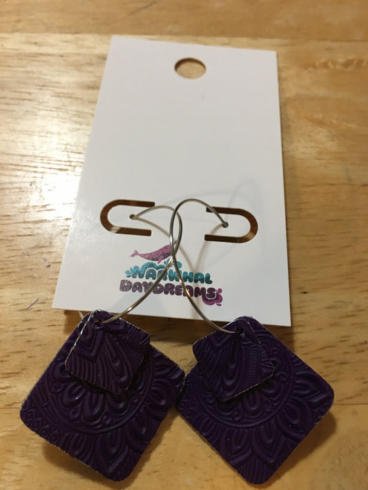 Textured dark purple squares on silver hoops with silver edging
