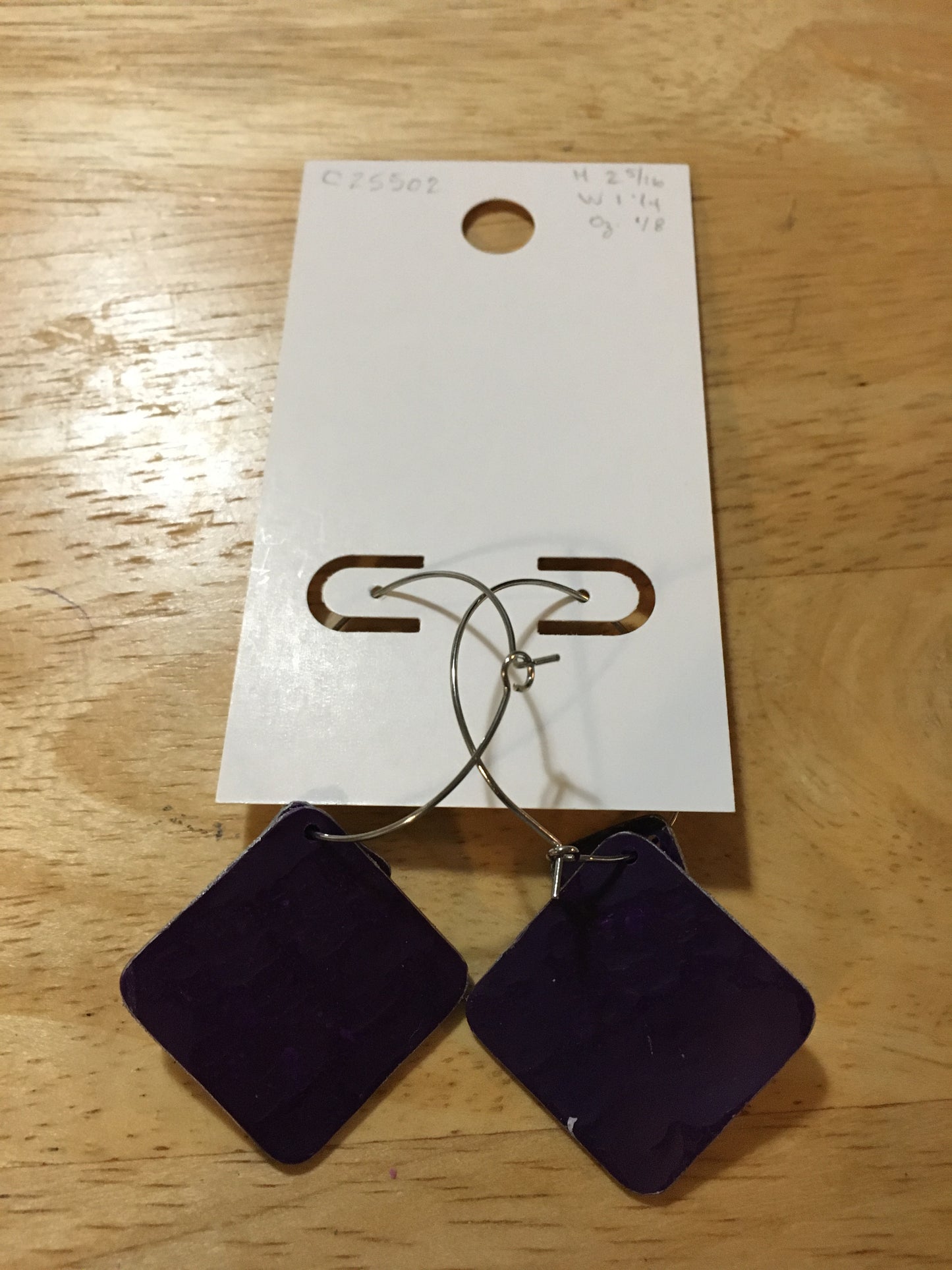 Textured dark purple squares on silver hoops with silver edging