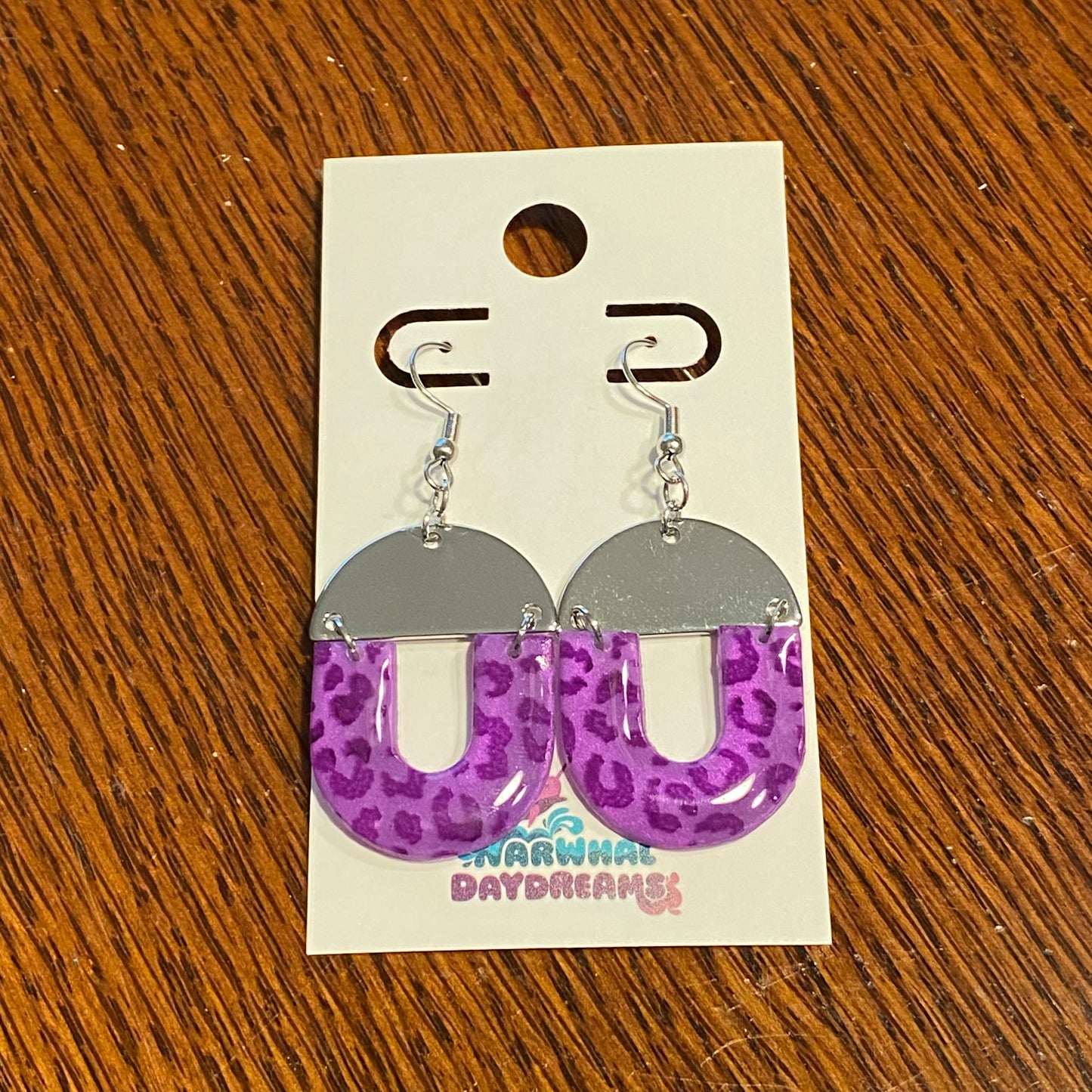 Purple cheetah U earrings