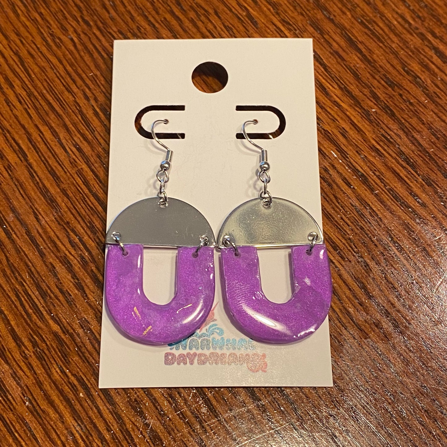 Purple cheetah U earrings